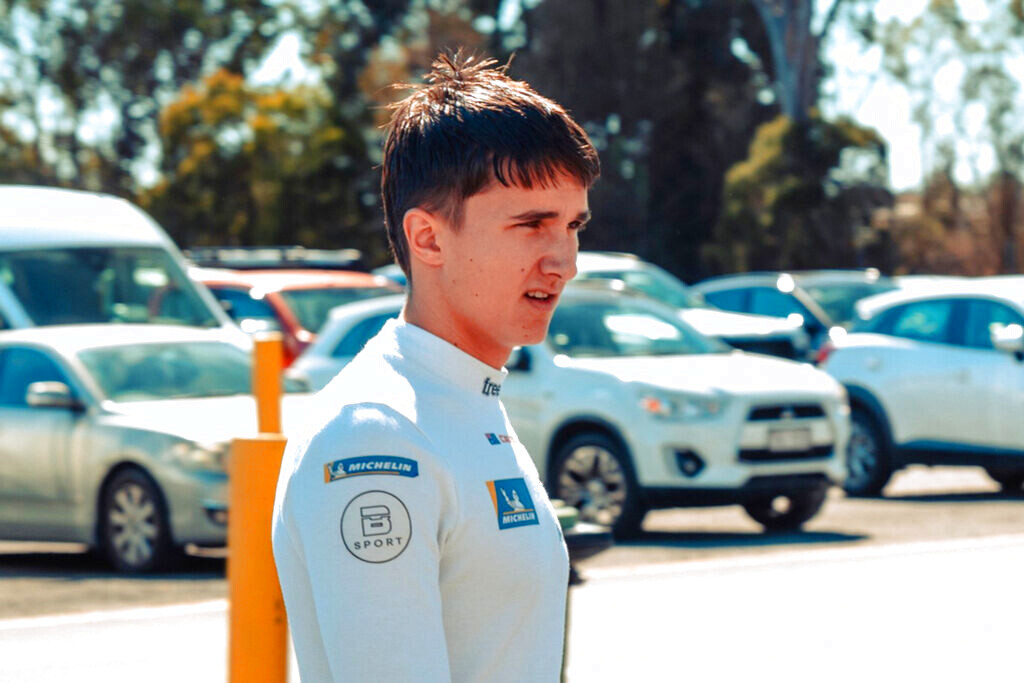 Caleb Sumich #14 racing at Queensland Raceway 2024